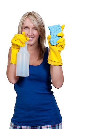 simsearch:400-08693600,k - Aglove wearing beautiful woman or maid cleaning house with a sponge and spray bottle with cleaner Stock Photo - Budget Royalty-Free & Subscription, Code: 400-04898553