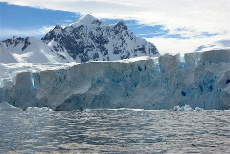 simsearch:400-04747906,k - Huge iceberg in Antarctica, blue sky, azure water, sunny day. Stock Photo - Budget Royalty-Free & Subscription, Code: 400-04899698