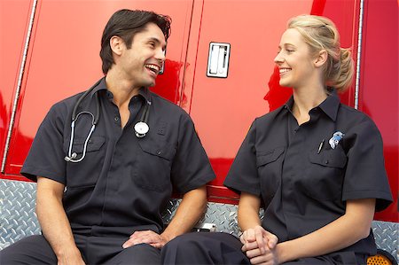 simsearch:400-05343071,k - Two paramedics laughing together Stock Photo - Budget Royalty-Free & Subscription, Code: 400-04890144