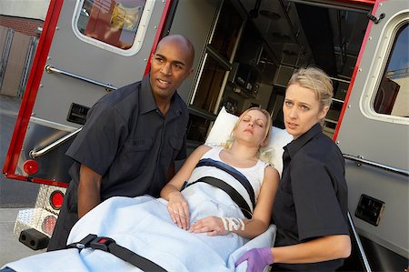 simsearch:400-05343071,k - Paramedics unloading patient from ambulance Stock Photo - Budget Royalty-Free & Subscription, Code: 400-04890178