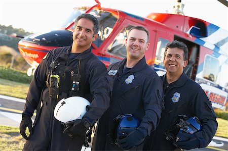 simsearch:400-05343071,k - Portrait of paramedics standing in front of Medevac Stock Photo - Budget Royalty-Free & Subscription, Code: 400-04890189