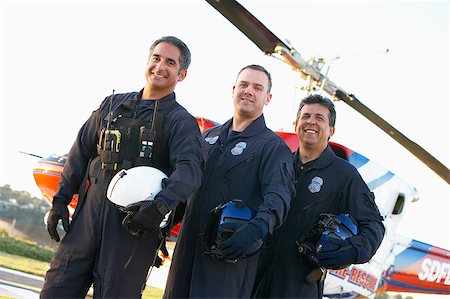 simsearch:400-05343071,k - Portrait of paramedics standing in front of Medevac Stock Photo - Budget Royalty-Free & Subscription, Code: 400-04890190