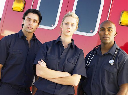 simsearch:400-05343071,k - Portrait of paramedics standing in front of an ambulance Stock Photo - Budget Royalty-Free & Subscription, Code: 400-04890204