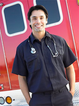 simsearch:400-05343071,k - Portrait of paramedic in front of ambulance Stock Photo - Budget Royalty-Free & Subscription, Code: 400-04890209