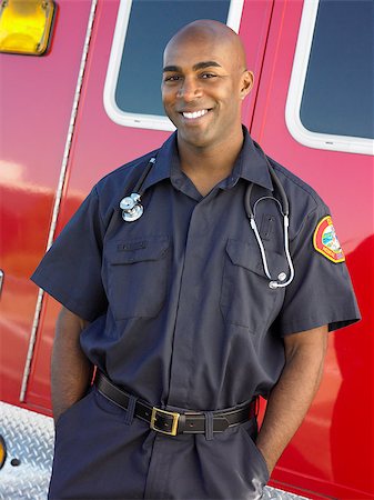 simsearch:400-05343071,k - Portrait of paramedic in front of ambulance Stock Photo - Budget Royalty-Free & Subscription, Code: 400-04890210