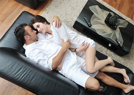 simsearch:400-04412244,k - Portrait of a relaxed young guy using laptop at home indoor Stock Photo - Budget Royalty-Free & Subscription, Code: 400-04891342