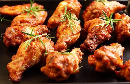 simsearch:400-06079651,k - Hot chicken wings on baking tray Stock Photo - Budget Royalty-Free & Subscription, Code: 400-04892636