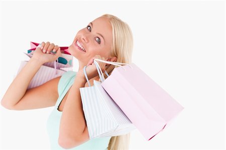 simsearch:400-04904785,k - Woman enjoying her shopping in a studio Stock Photo - Budget Royalty-Free & Subscription, Code: 400-04904783
