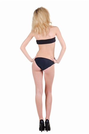 simsearch:614-01179436,k - Beautiful young woman in bathing suit looking at wall. Rear view. Stock Photo - Budget Royalty-Free & Subscription, Code: 400-04908324