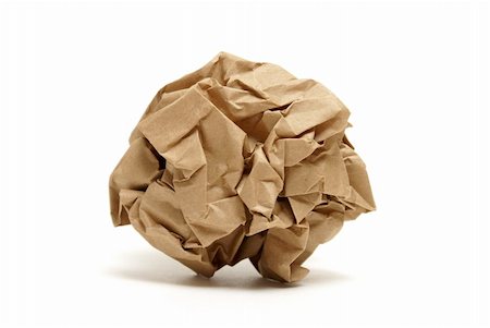 A crumpled piece of brown paper isolated on a white background. Stock Photo - Budget Royalty-Free & Subscription, Code: 400-04909063