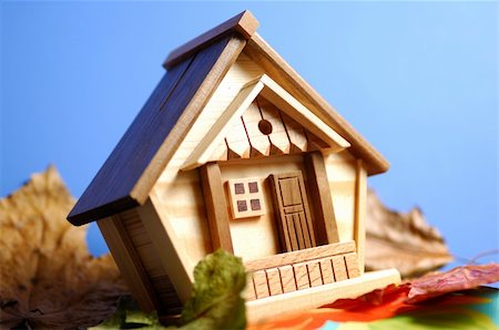 simsearch:400-04909150,k - Little wooden house model under blue sky Stock Photo - Budget Royalty-Free & Subscription, Code: 400-04909145