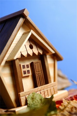 simsearch:400-04909150,k - Little wooden house model under blue sky Stock Photo - Budget Royalty-Free & Subscription, Code: 400-04909710