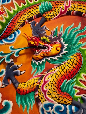 Dragon sculpture on wall Stock Photo - Budget Royalty-Free & Subscription, Code: 400-04909762