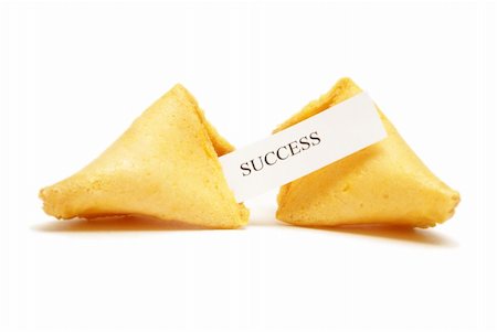 A cracked open fortune cookie stating the word success. Stock Photo - Budget Royalty-Free & Subscription, Code: 400-04900216