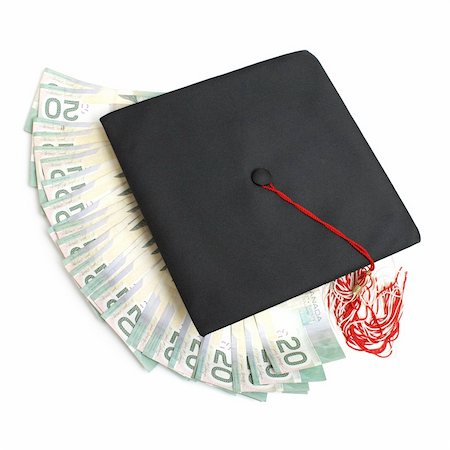 simsearch:400-04408371,k - A grad hat with spread out money for an education or tuition fee concept. Stock Photo - Budget Royalty-Free & Subscription, Code: 400-04900488