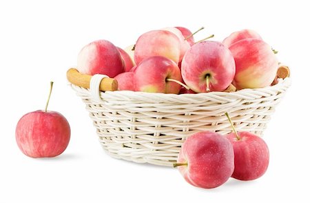 simsearch:400-07096505,k - Overfull backet with mini apples isolated on white background Stock Photo - Budget Royalty-Free & Subscription, Code: 400-04914556