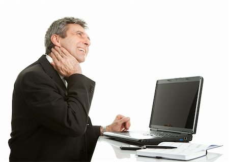 Senior business men having neck pain. Isolated on white Stock Photo - Budget Royalty-Free & Subscription, Code: 400-04915393