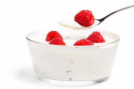 simsearch:824-07586355,k - raspberry on a spoon over a dessert in a bowl with raspberries on white background Stock Photo - Budget Royalty-Free & Subscription, Code: 400-04916909