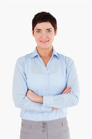 executive standing white background - Portrait of a woman with the arms crossed facing the camera Photographie de stock - Aubaine LD & Abonnement, Code: 400-04917672