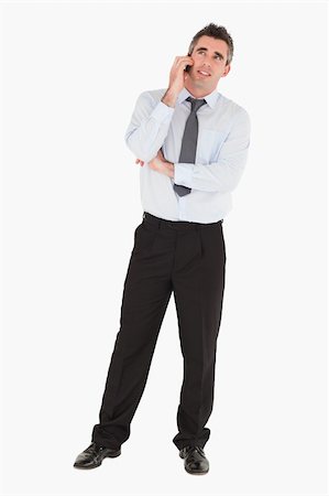 simsearch:400-05145011,k - Businessman making a phone call against a white background Stock Photo - Budget Royalty-Free & Subscription, Code: 400-04918034