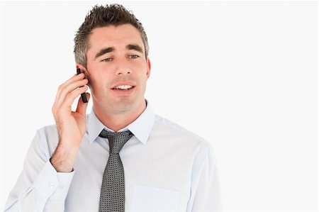 simsearch:400-05145011,k - Business manager making a phone call against a white background Stock Photo - Budget Royalty-Free & Subscription, Code: 400-04918100
