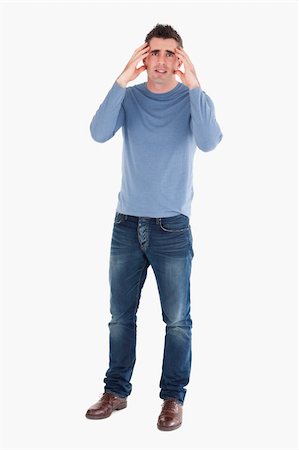 simsearch:400-04918265,k - Anxious man posing against a white background Stock Photo - Budget Royalty-Free & Subscription, Code: 400-04918265