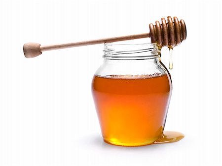 simsearch:400-05135233,k - Jar of honey with a wooden drizzler on top. Isolated on white background. Foto de stock - Super Valor sin royalties y Suscripción, Código: 400-04919430
