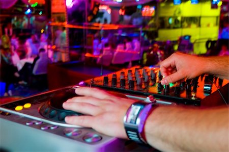 simsearch:400-04630784,k - Dj playing the track in the nightclub at a party Stock Photo - Budget Royalty-Free & Subscription, Code: 400-04919646