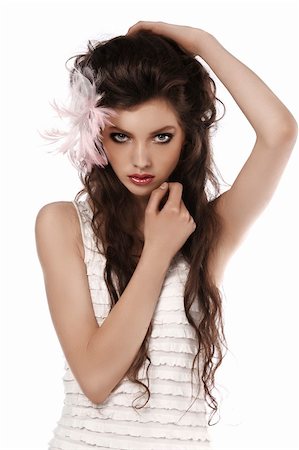 simsearch:400-04130120,k - young fashion brunette posing on white wearing a pink feather in her hair Stock Photo - Budget Royalty-Free & Subscription, Code: 400-04911163