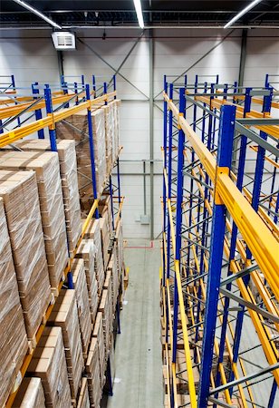 The racks and shelves of a huge warehouse seen from above Stock Photo - Budget Royalty-Free & Subscription, Code: 400-04913170