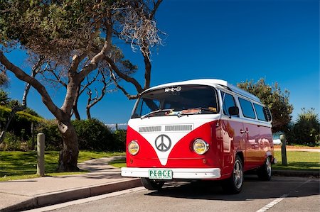 A red and white  van parked at the beach Stock Photo - Budget Royalty-Free & Subscription, Code: 400-04913932