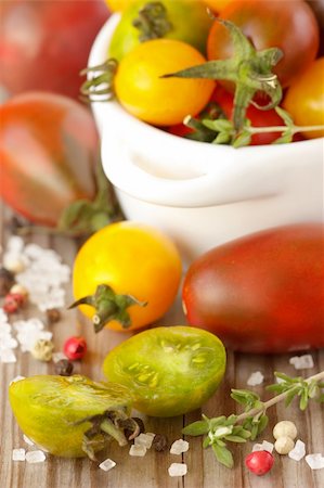 simsearch:400-04393672,k - Colorful tomatoes, thyme and salt on a wooden board. Stock Photo - Budget Royalty-Free & Subscription, Code: 400-04925007