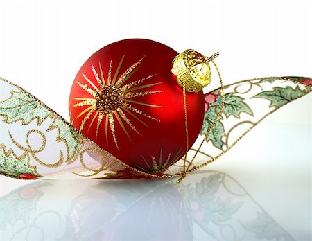 Red Christmas ball with a curly ribbon Stock Photo - Budget Royalty-Free & Subscription, Code: 400-04925835