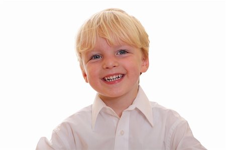 simsearch:400-04151135,k - Portrait of a happy young boy on white background Stock Photo - Budget Royalty-Free & Subscription, Code: 400-04920935