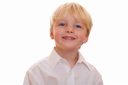 simsearch:400-04151135,k - Portrait of a happy young boy on white background Stock Photo - Budget Royalty-Free & Subscription, Code: 400-04920936
