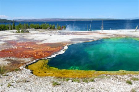 simsearch:400-05705152,k - Dazzling colors of Abyss Pool in the West Thumb Geyser Basin of Yellowstone National Park. Stock Photo - Budget Royalty-Free & Subscription, Code: 400-04921200