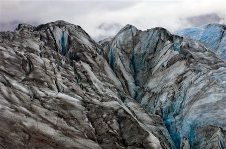 The crevases and icy textured surface of the Svinafellsjokull in Iceland Stock Photo - Budget Royalty-Free & Subscription, Code: 400-04923465