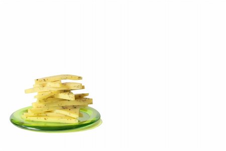 simsearch:625-01261270,k - Sliced cheese on the green plate over white Stock Photo - Budget Royalty-Free & Subscription, Code: 400-04935152