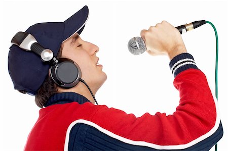 Disc jockey with headphones singing on white background Stock Photo - Budget Royalty-Free & Subscription, Code: 400-04936778