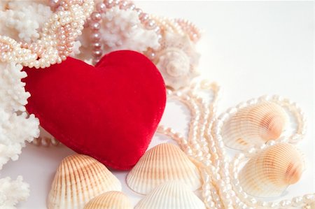 staghorn coral - red velvet heart with pearl beads, shells and corals on white background with copy space in the top-right corner Stock Photo - Budget Royalty-Free & Subscription, Code: 400-04937863