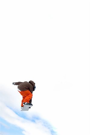 simsearch:400-03985663,k - a snowboarder jumping high through a blue sky Stock Photo - Budget Royalty-Free & Subscription, Code: 400-04939760