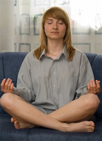 young woman doing yoga and relaxing Stock Photo - Budget Royalty-Free & Subscription, Code: 400-04931877