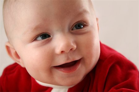 Baby Boy Smiling in his Santa Claus Outfit Stock Photo - Budget Royalty-Free & Subscription, Code: 400-04933291