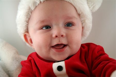 Baby Boy Wearing a Santa Claus Outfit and Hat Stock Photo - Budget Royalty-Free & Subscription, Code: 400-04933292