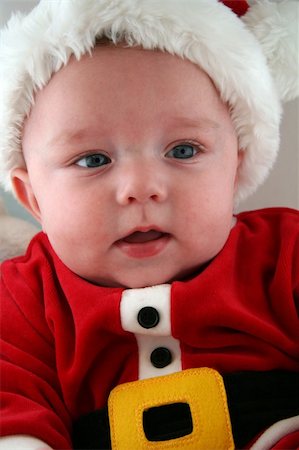 Baby Boy wearing a Santa Claus Outfit and Hat Stock Photo - Budget Royalty-Free & Subscription, Code: 400-04933305