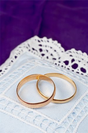 simsearch:400-04978489,k - Two gold wedding rings with shallow depth of field Stock Photo - Budget Royalty-Free & Subscription, Code: 400-04933986