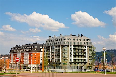simsearch:693-06667917,k - A built modern apartments blocks over a sunny sky Stock Photo - Budget Royalty-Free & Subscription, Code: 400-04944176