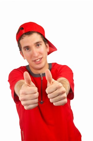 simsearch:400-04335148,k - Smiling handsome boy with red t-shirt over a white background. Success gesture and two finger on focus. Foto de stock - Super Valor sin royalties y Suscripción, Código: 400-04944435