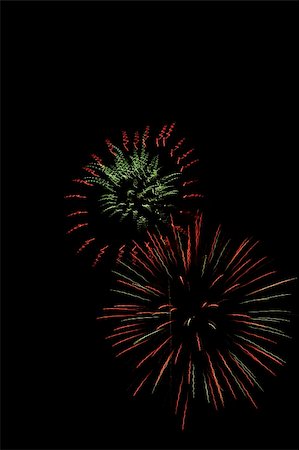 simsearch:400-04882938,k - Multiple fireworks burst on a dark night sky Stock Photo - Budget Royalty-Free & Subscription, Code: 400-04944901