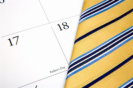 family planning - A tie and calendar showing father's day. Photographie de stock - Aubaine LD & Abonnement, Code: 400-04946659